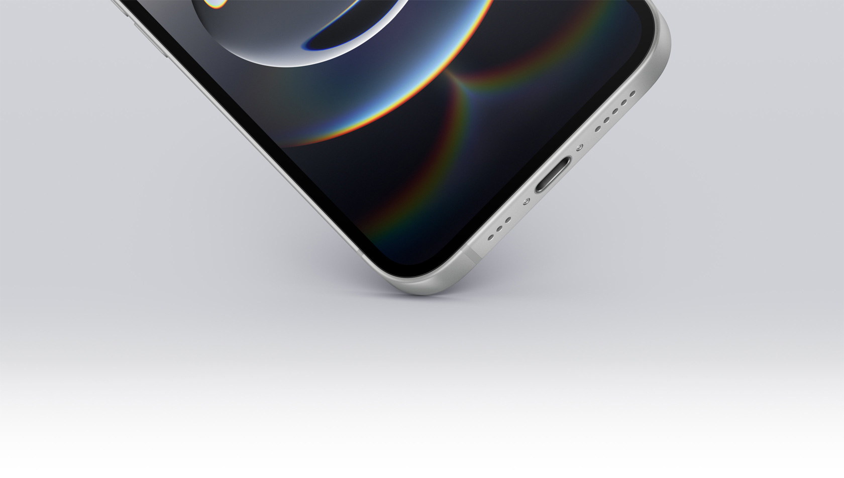 iPhone 16e 用底部一角作为支点，倾斜的机身显露出 USB-C 端口。